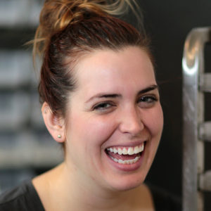 woman smiling with dental implants